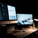Image of two computers showing off web design in progress